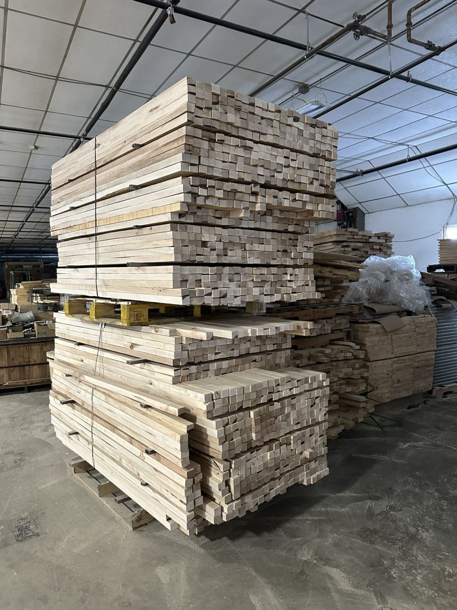 Solid wood stiles stacked in production