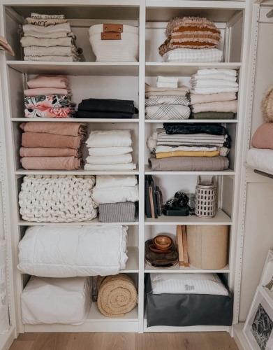 Solid wood Lundia shelving in a bedroom