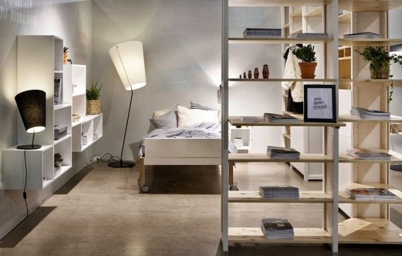 Solid wood Lundia shelving in a bedroom