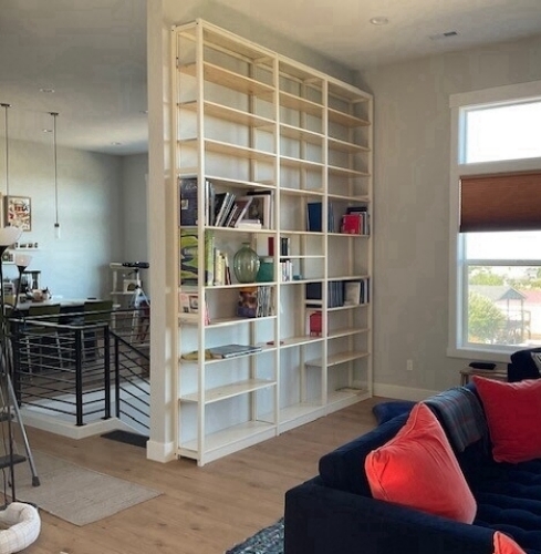 Solid wood Lundia shelving in a residential living space