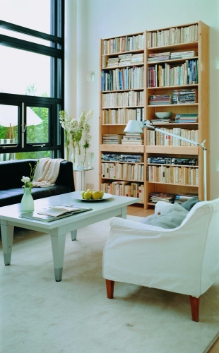 Solid wood Lundia shelving in a residential living space