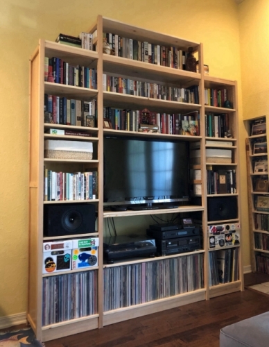 Solid wood Lundia shelving in a residential living space