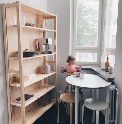 Solid wood Lundia shelving in a residential living space