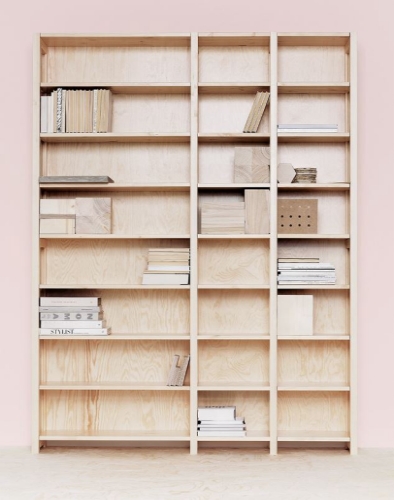 Solid wood Lundia shelving in a residential living space