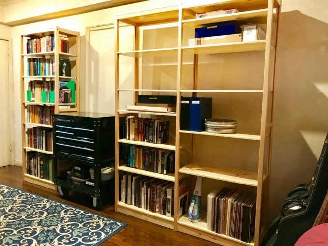 Solid wood Lundia shelving in a residential living space