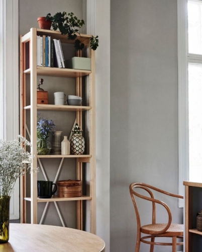 Solid wood Lundia shelving in a residential living space