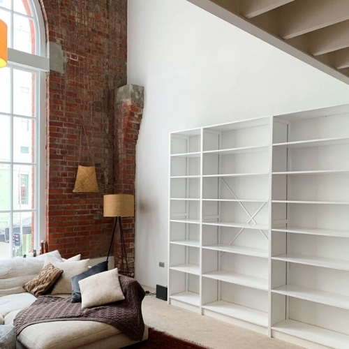 Solid wood Lundia shelving in a residential living space