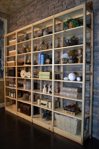 Solid wood Lundia shelving in a residential living space
