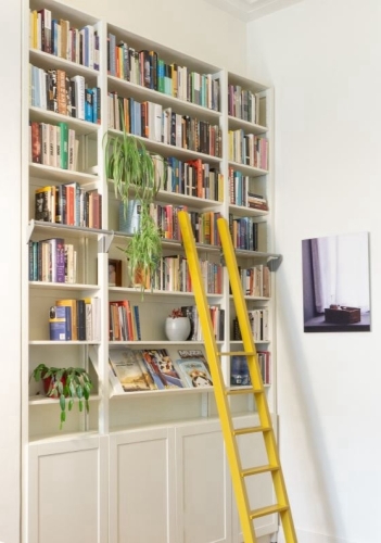 Solid wood Lundia shelving in a residential living space