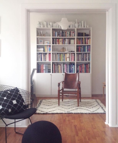 Solid wood Lundia shelving in a residential living space
