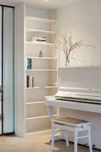 Solid wood Lundia shelving in a residential living space