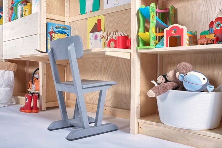 Solid wood Lundia shelving in a kids room