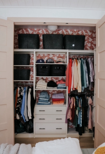 Solid wood Lundia shelving in a kids room