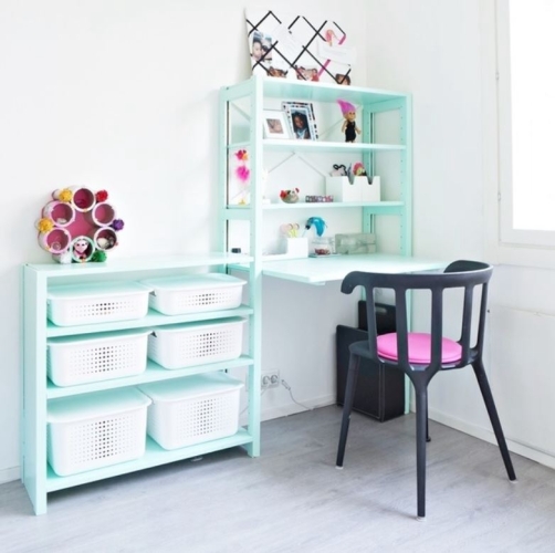 Solid wood Lundia shelving in a kids room