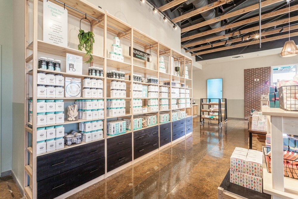 Retail shelving with drawers in laundry display