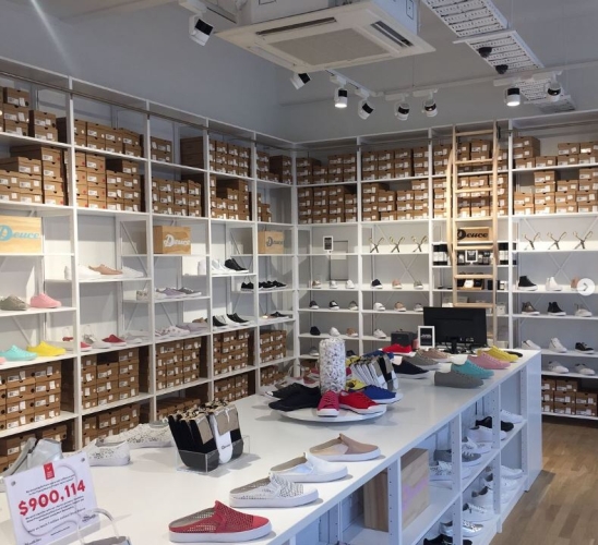 Solid wood Lundia shelving in a home work space