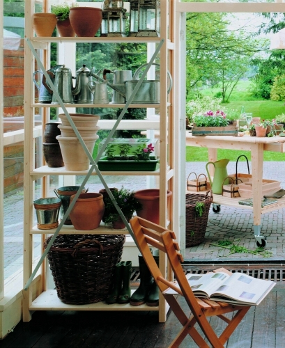 Solid wood Lundia shelving in a home work space