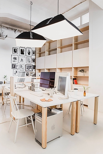 Solid wood Lundia shelving in a home work space