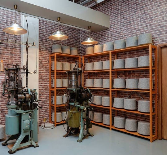 Solid wood Lundia shelving in a home work space